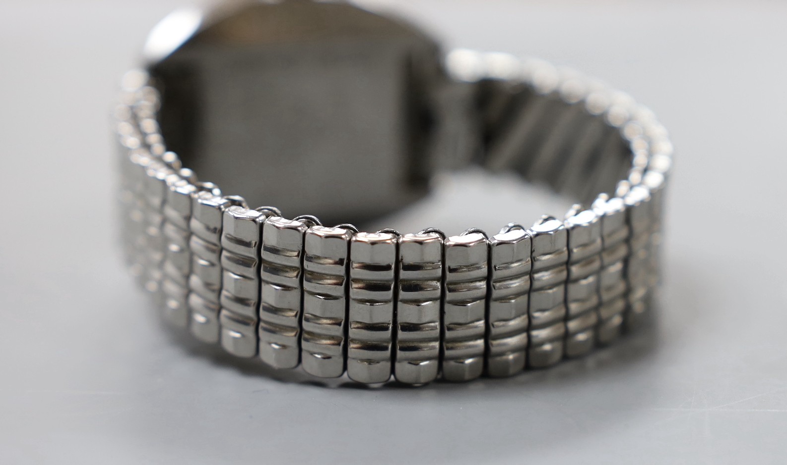 A gentleman's stainless steel Omega Seamaster Cosmic automatic wrist watch, the case back engraved with name and date, on associated flexible bracelet.